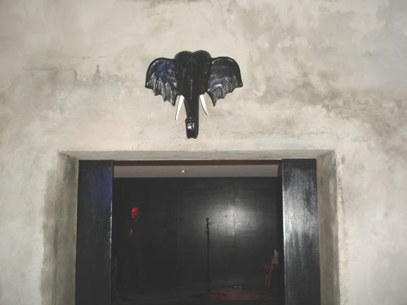 stage and dance area seen from the bar of the Elephant Head Poetry Club